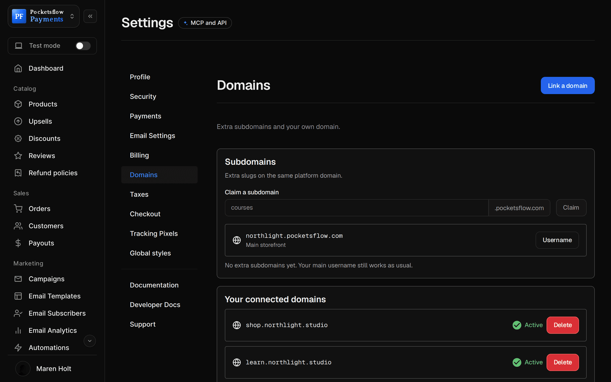Settings, Domains: claim extra subdomains on pocketsflow.com, the main northlight.pocketsflow.com storefront, and connected domains shop.northlight.studio and learn.northlight.studio marked Active
