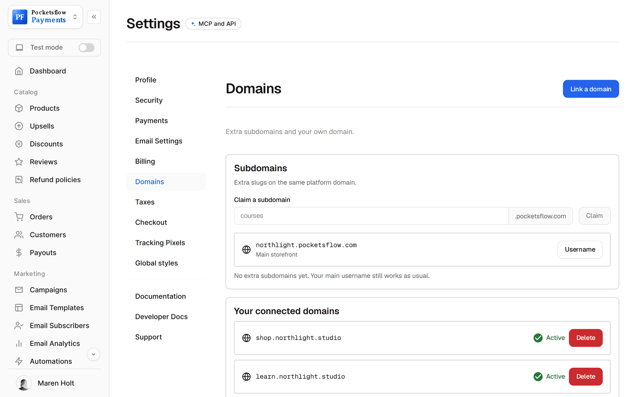 Settings, Domains: claim extra subdomains on pocketsflow.com, the main northlight.pocketsflow.com storefront, and connected domains shop.northlight.studio and learn.northlight.studio marked Active